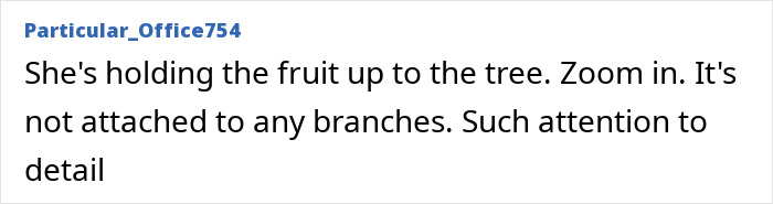 Meghan Markle holding fruit near a tree in a photo sparking accusations about the authenticity of her fruit-picking activity