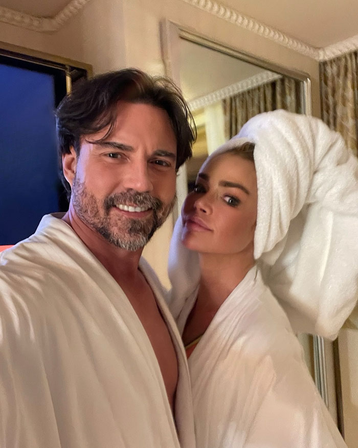 Denise Richards with estranged husband in robes, linked to assault accusations and graphic descriptions shared online. Denise Richards with estranged husband in robes, linked to assault accusations and graphic descriptions shared online.