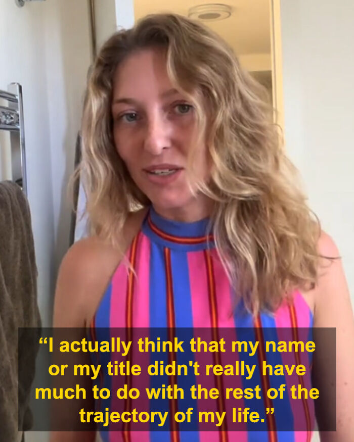 Young woman in colorful striped dress sharing her story as a descendant of the last king of Mongolia.