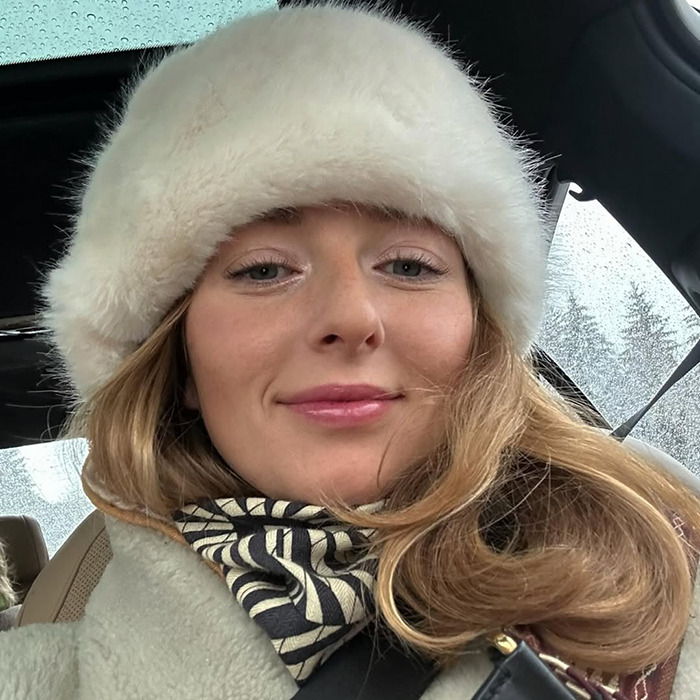 Young woman in a white fur hat and coat inside a car, descendant of the last king of Mongolia revealed online.