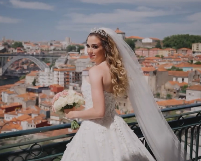 Bride in a wedding dress holding a bouquet, symbolizing reminder of life's fragility and emotional heartbreak.