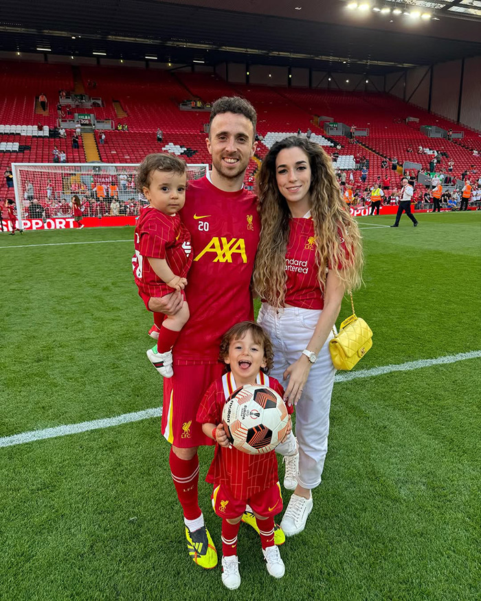Diogo Jota with family on football pitch, highlighting reminder of life's fragility and heartbreak before passing at 28.