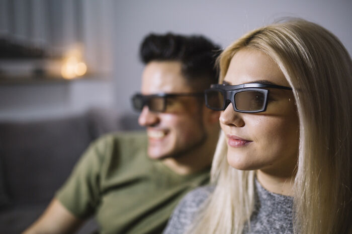 Two people wearing 3D glasses, enjoying an immersive experience, inspired by escape room employees stories. - 19