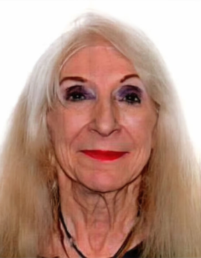 Elderly woman with long blonde hair and red lipstick linked to police discovery of skeletal remains in hoarder ex-cop house of horrors.