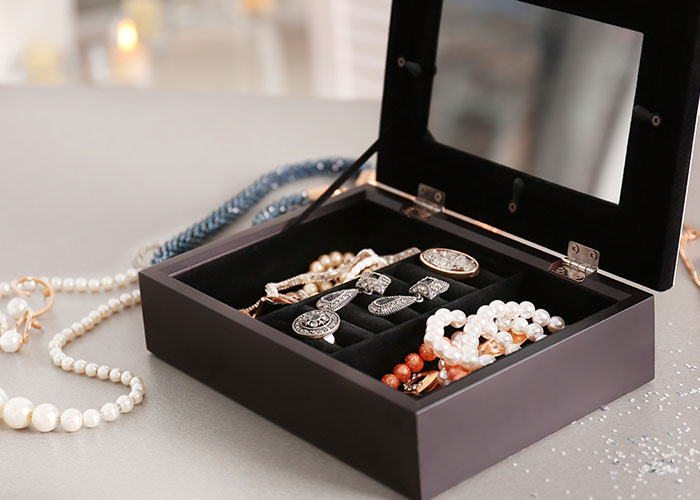 Jewelry box with pearls and earrings, symbolizing stolen items in pregnant woman revenge after friend’s guest incident. - 28