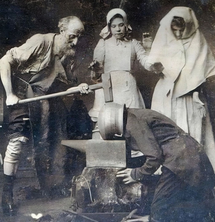 Historic unsettling medical device demonstrating primitive treatment with heavy hammer and metal helmet apparatus.