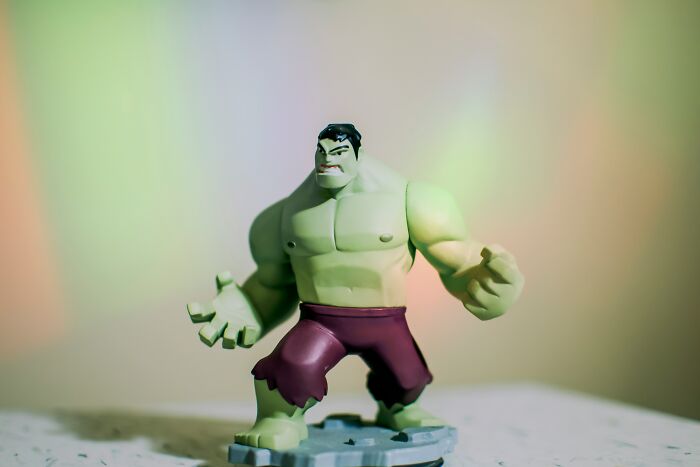 Green Hulk action figure with torn purple pants posed on a surface, illustrating harmless lies parents told according to netizens. - 19