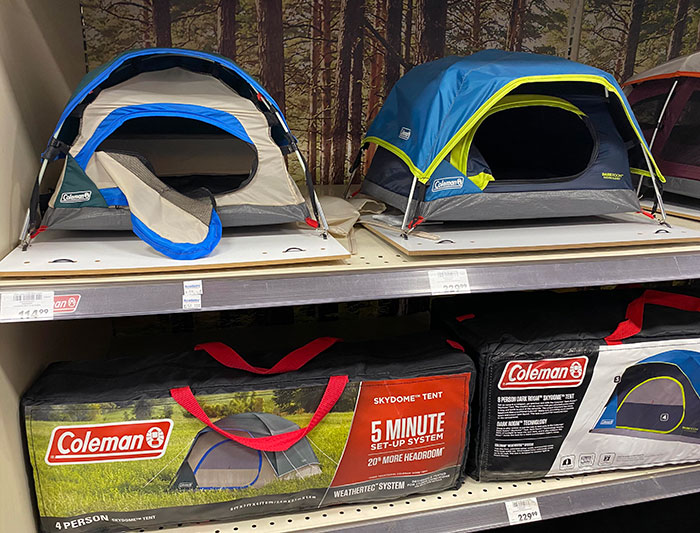 Coleman tents demonstrating real-world designs with quick setup and innovative features on store shelves.
