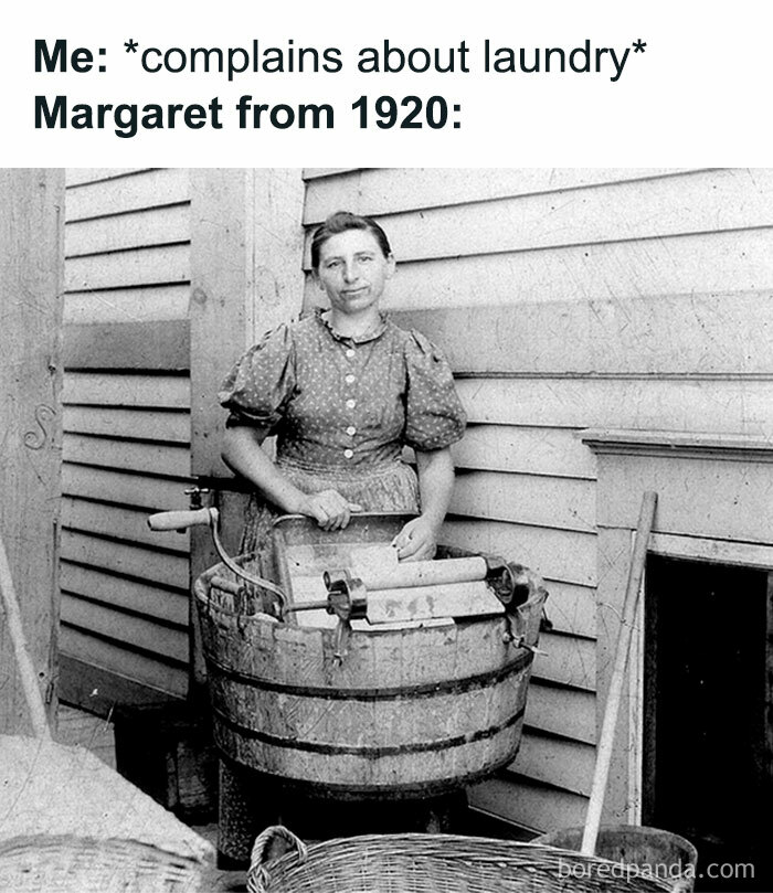Woman in 1920s washing clothes by hand, illustrating good old days chores before modern laundry machines.