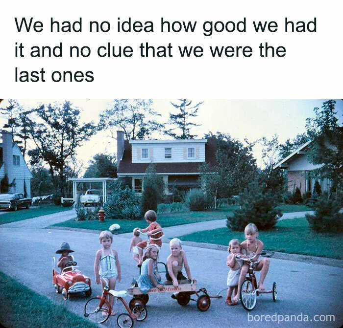 Children playing outside on bikes and wagons in a nostalgic neighborhood scene from the good old days of the 1980s.