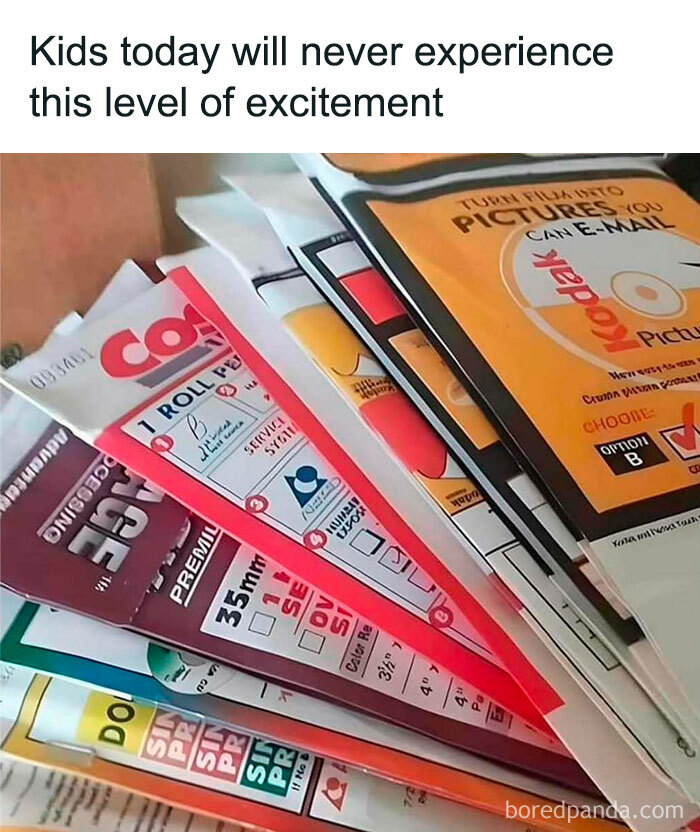 Stacks of vintage film developing envelopes symbolizing good old days memories from the 80s for those who grew up then.