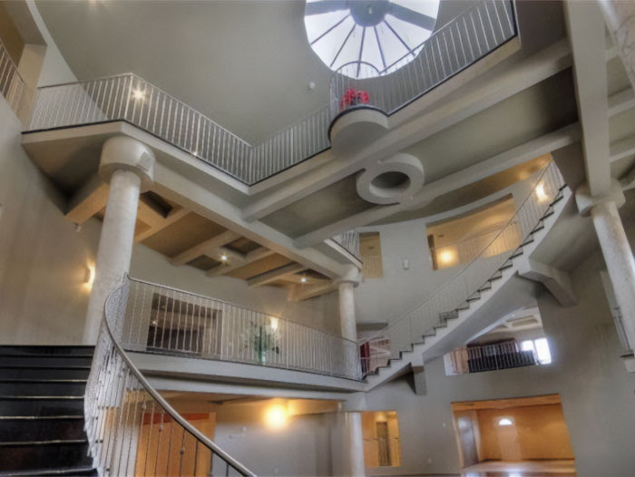 Interior of a home featuring complex staircases and railings, showcasing creative home design that failed in e*******n.