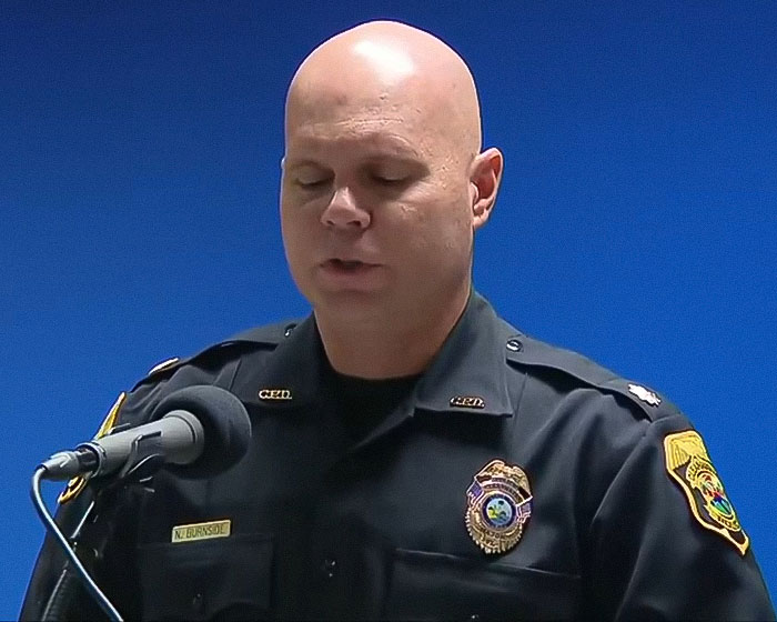 Police officer giving a press conference about Hulk Hogan revealing pro wrestler's final moments and 911 call.