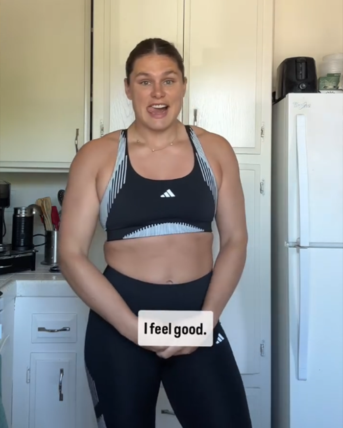 Ilona Maher in athletic wear standing in kitchen, smiling and responding to Kate Moss quote about being skinny. - 2