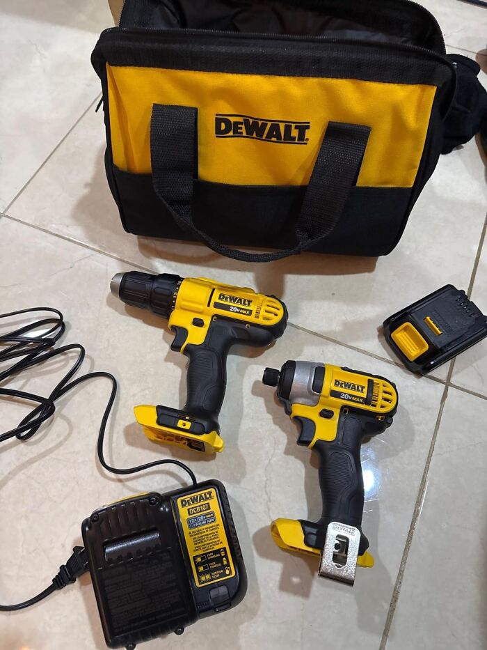 DeWalt power tools including drill, impact driver, battery, charger, and carrying bag featured in deals on brands you love.