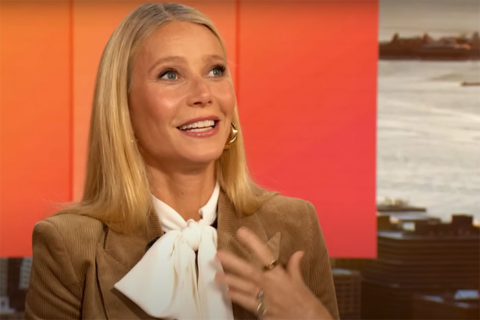 Actress speaking during an interview, sharing favorite and awkward encounters with celebrities on a talk show set. - 16