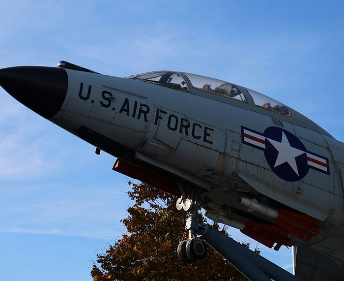 U.S. Air Force jet on display under clear blue sky, illustrating cool facts about the world this June.