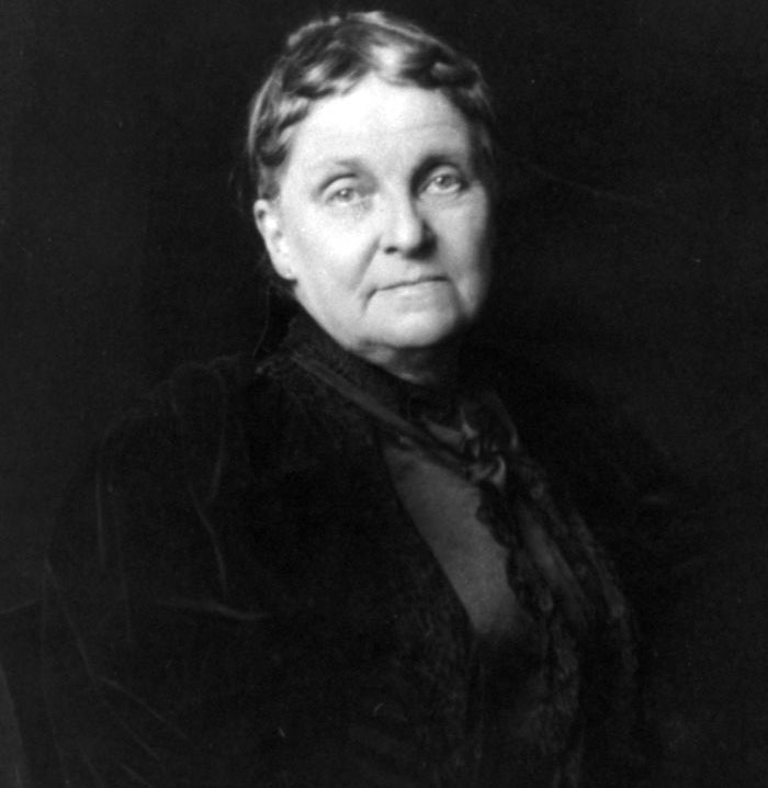 Black and white portrait of an elderly woman in dark clothing representing cool facts about the world in history.