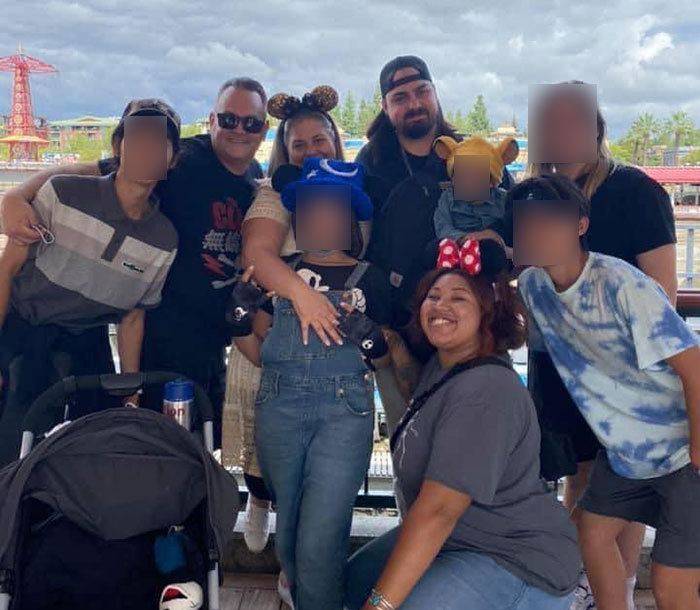 Family group photo with foster dad and Latina daughters, related to trafficked daughters accused by United Airlines crew.