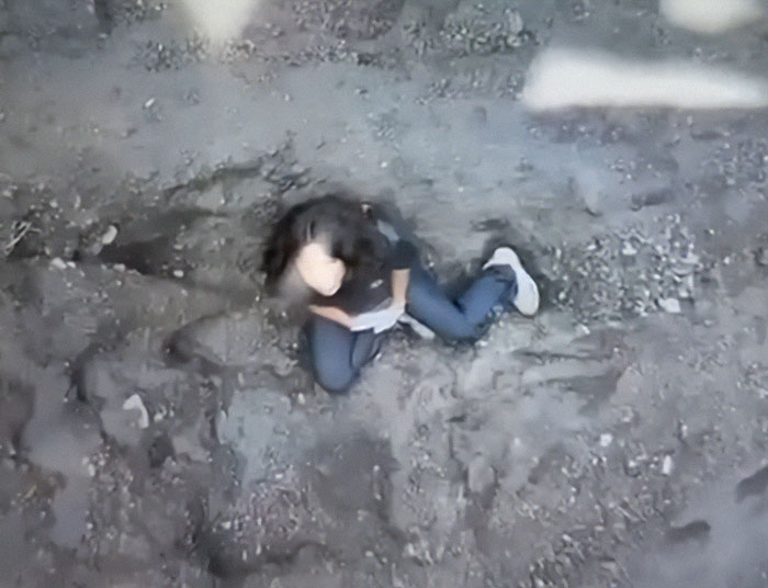 Tourist caught in drone footage moments before falling into volcano, autopsy reveals conflicting details of final moments.