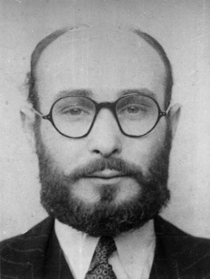 Black and white portrait of a bearded man wearing glasses, symbolizing bravery that changed the course of history. - 6