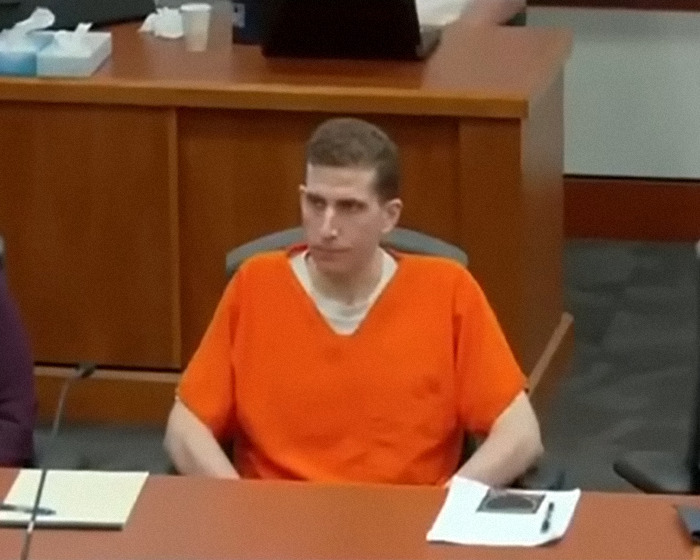 Bryan Kohberger in an orange prison jumpsuit seated in court during a hearing related to Kaylee Goncalves sister’s account. - 7