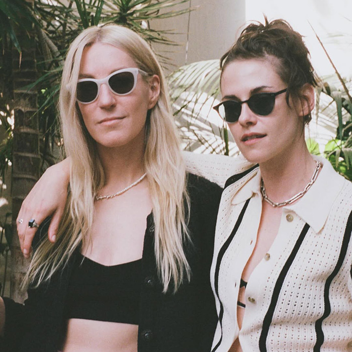 Kristen Stewart with new wife wearing sunglasses and stylish outfits while out walking the dog in a casual setting Kristen Stewart with new wife wearing sunglasses and stylish outfits while out walking the dog in a casual setting