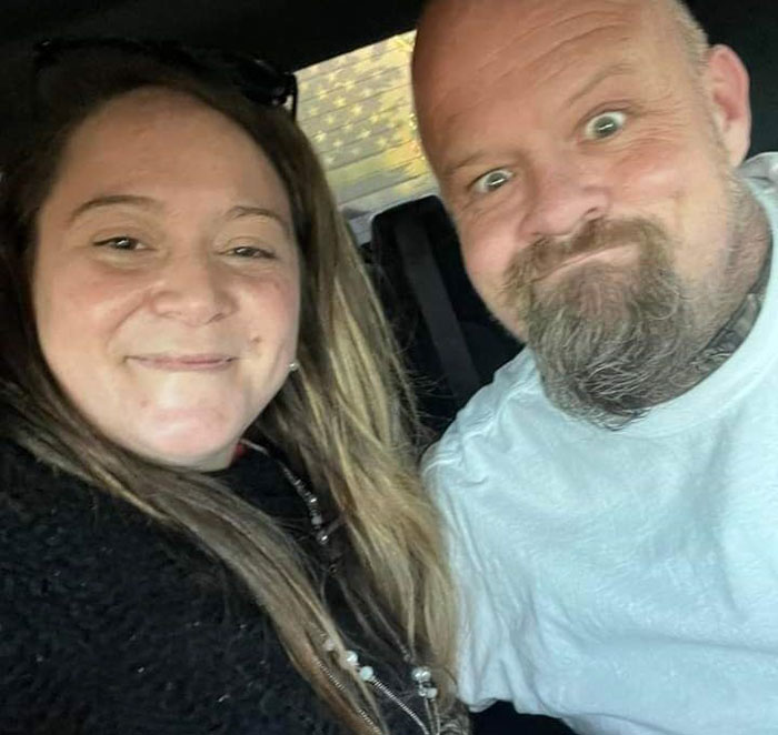 Smiling couple inside a car, related to chilling eulogy of 17YO girl made cops suspect she slayed her parents in sleep.
