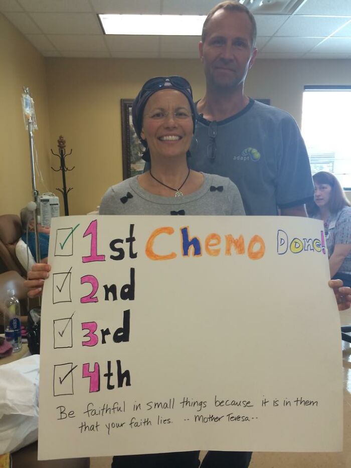 Woman smiling after completing first chemo, showing resilience and hope in cancer survivorship journey.