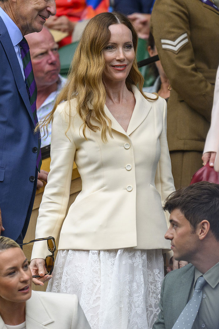Nicole Kidman at Wimbledon 2025 wearing an elegant cream blazer and lace skirt amid celebrity fashion highlights.
