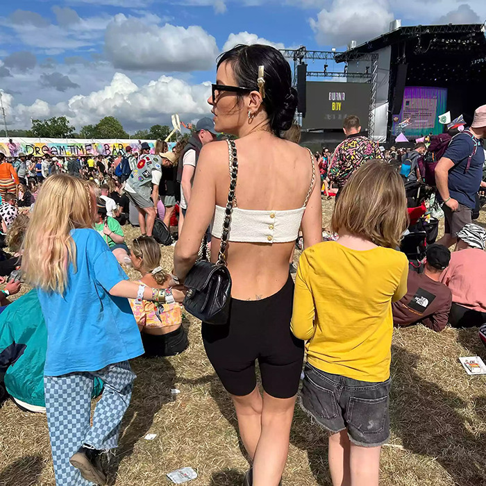 Lily Allen at outdoor festival with children, capturing attention amid talks of her abortions confession dividing the internet.
