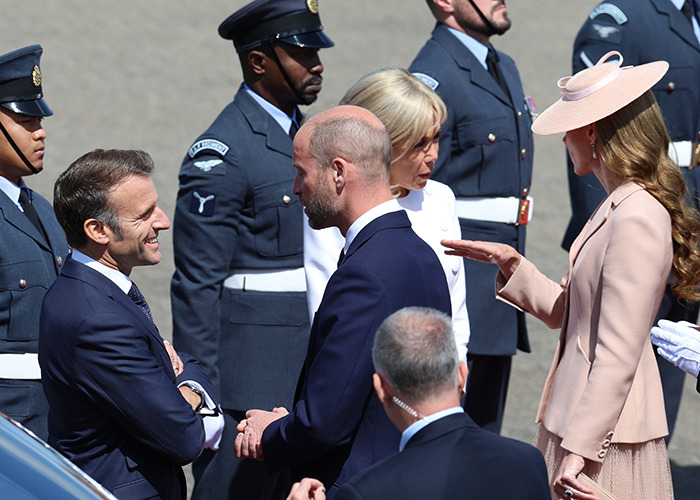 Brigitte Macron and Kate Middleton engaged in conversation during France visit, captured by lip reader with reactions nearby. Brigitte Macron and Kate Middleton engaged in conversation during France visit, captured by lip reader with reactions nearby.