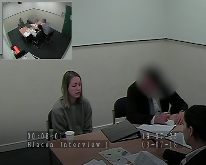 Police investigation room showing suspects and officers in an intense discussion related to foul play and arrests in baby deaths case Police investigation room showing suspects and officers in an intense discussion related to foul play and arrests in baby deaths case