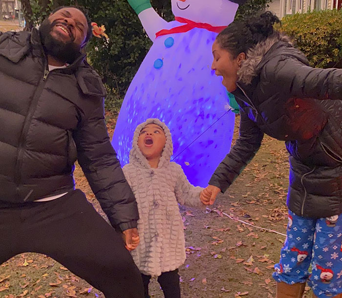 Malcolm-Jamal Warner with family enjoying outdoor holiday lights during one of his final public appearances. - 6