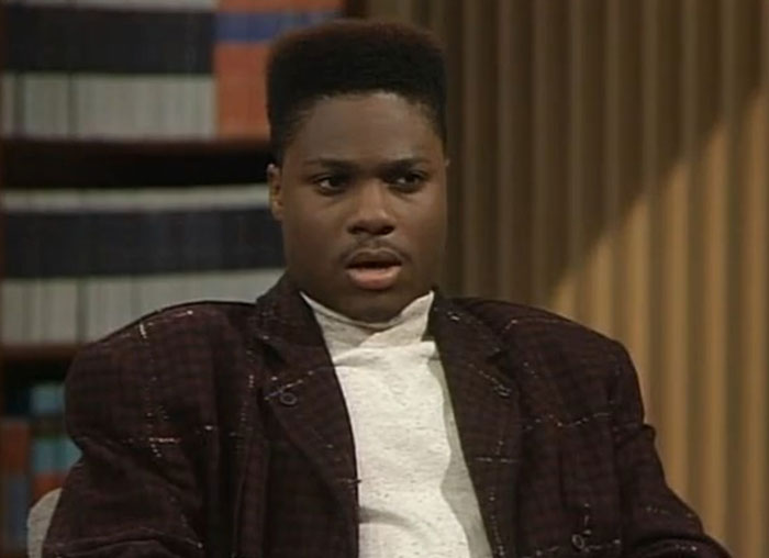 Malcolm-Jamal Warner in a dark jacket during one of his final public appearances amid mourning. - 12