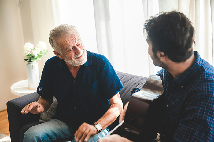 Older retiree and younger neighbor sharing a moment in apartment, highlighting unexpected quiet retiree passing story. Older retiree and younger neighbor sharing a moment in apartment, highlighting unexpected quiet retiree passing story.