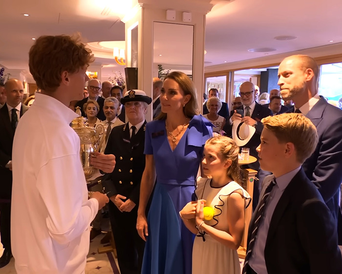 Matthew McConaughey showing gentlemanly gesture to British royalty during Wimbledon final trophy presentation.