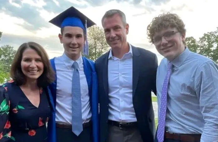 Family posing outdoors at a graduation ceremony amid Coldplay scandal and CEO past comments about HR chief he kissed