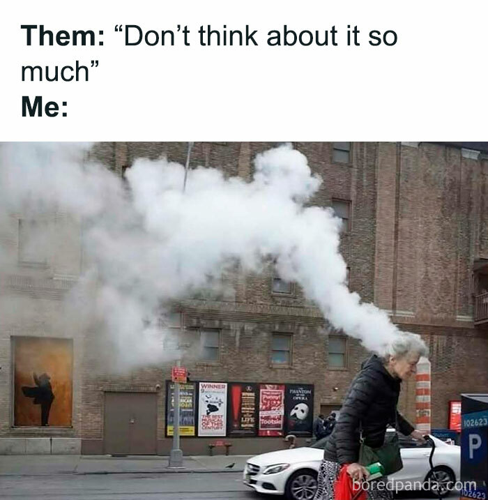 Elderly woman walking with thick white smoke coming from her head, illustrating chaotic and random meme humor.