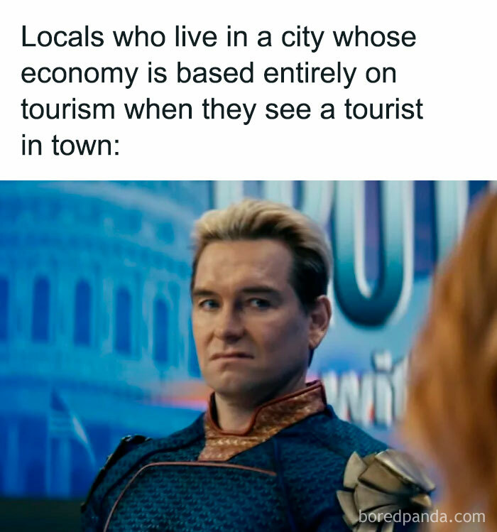 Man in a blue uniform giving a skeptical look, illustrating random and chaotic memes with unexpectedly funny expressions.