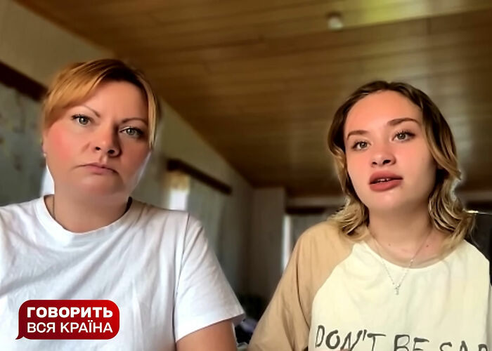 A woman and her daughter sit indoors, sharing a serious moment while discussing the model's mom revealed scalping incident. - 12