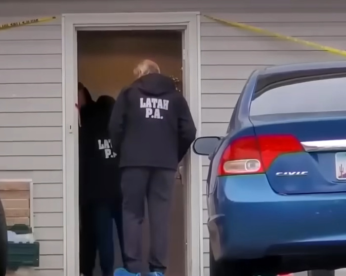 Investigators from Latah P.A. entering a house at a crime scene linked to Bryan Kohberger's victim massacre case.