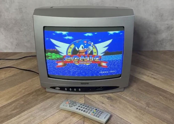 Old CRT television displaying Sonic the Hedgehog game, highlighting powerful marketing campaigns in retro gaming.
