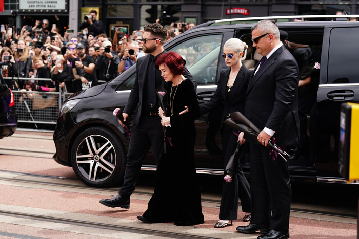Sharon Osbourne, tearful and supported by children, joins heartbreaking farewell at Ozzy Osbourne's funeral. Sharon Osbourne, tearful and supported by children, joins heartbreaking farewell at Ozzy Osbourne's funeral.