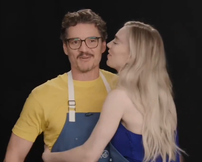 Pedro Pascal wearing glasses and a yellow shirt hugging Vanessa Kirby during a viral press tour interview moment Pedro Pascal wearing glasses and a yellow shirt hugging Vanessa Kirby during a viral press tour interview moment