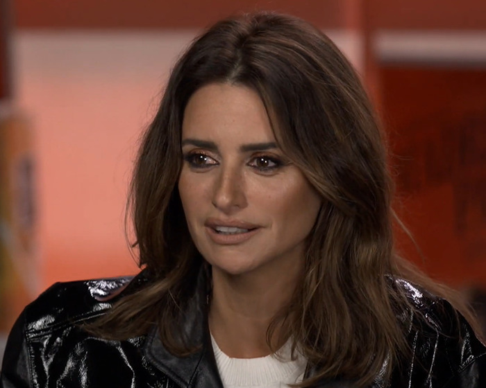 Pirates of the Caribbean actress looking elegant with natural makeup and loose hair in a close-up portrait at Paris Fashion Week.
