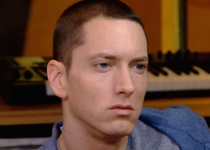 Close-up of a man in a casual setting, part of a story on people who went to school with celebrities.