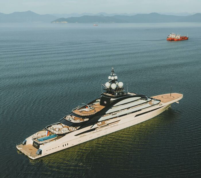 Luxury yacht cruising on calm sea, one of the highest-value collectible items sold for an astonishing price.