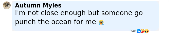 Malcolm-Jamal Warner at one of his final public appearances, wearing a dark jacket and speaking with someone nearby.