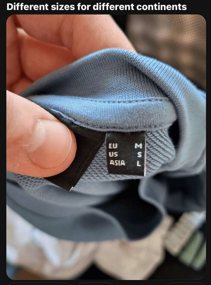 Clothing tag showing different size labels for EU, US, and Asia, illustrating interesting infographics and data differences.